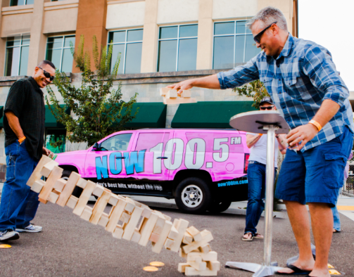 Two men playing Jenga