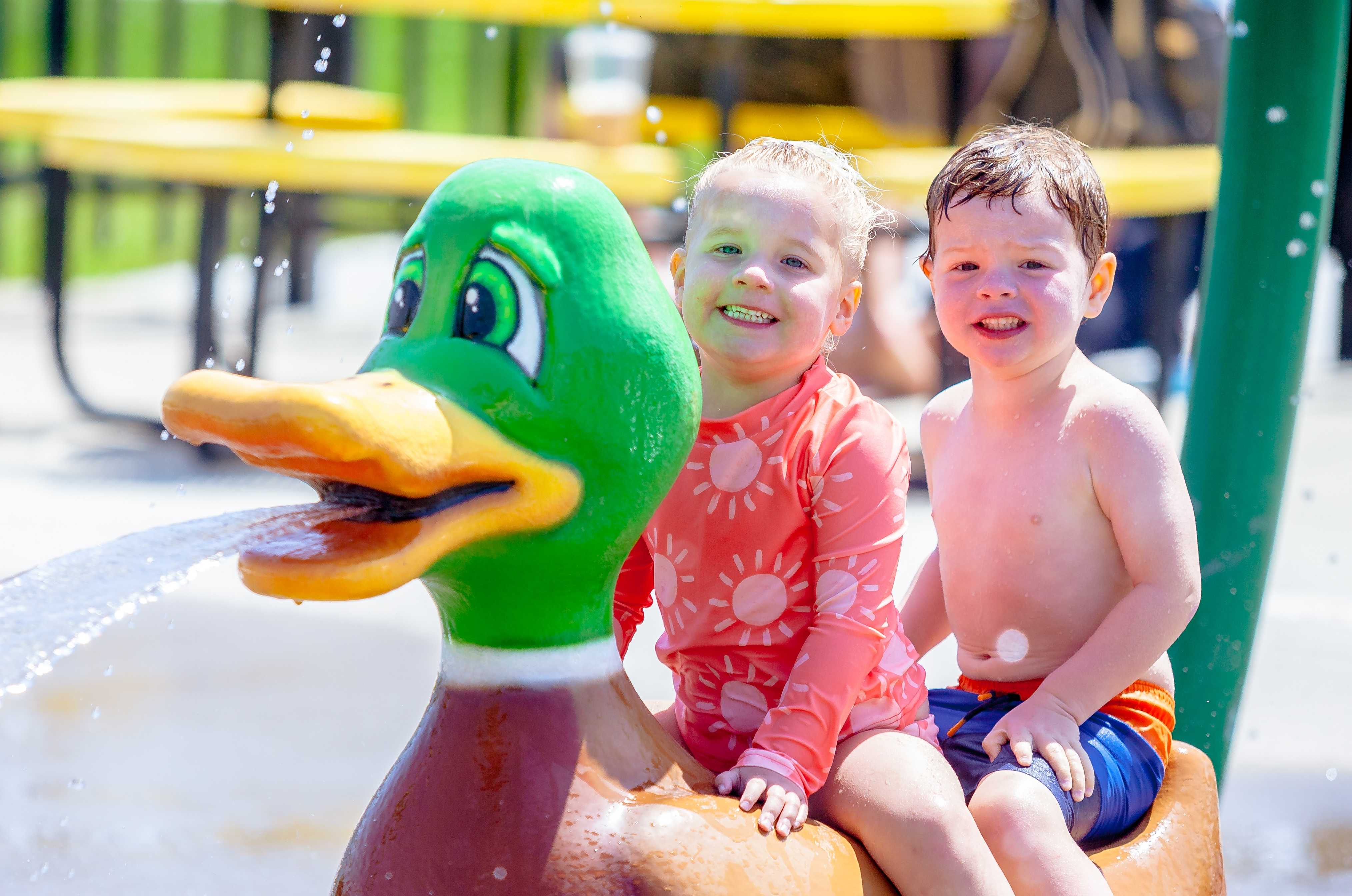 Kids playing on the Sprayground at the Roseville Aquatics Complex