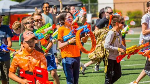 Blaster Blitz participants participating in the event with foam dart blasters