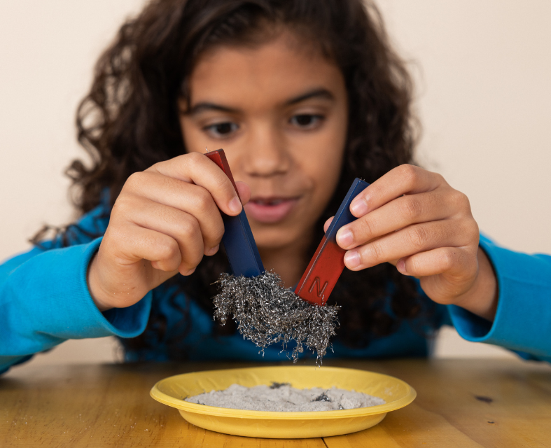 Girl playing with magnets